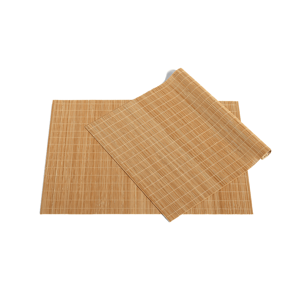 Bamboo Place Mat Set of 2, Natural by HAY, on a green background