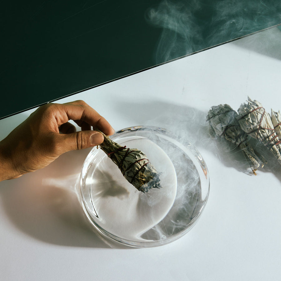 Sage Bundle by Earl of East, smouldering in a glass dish